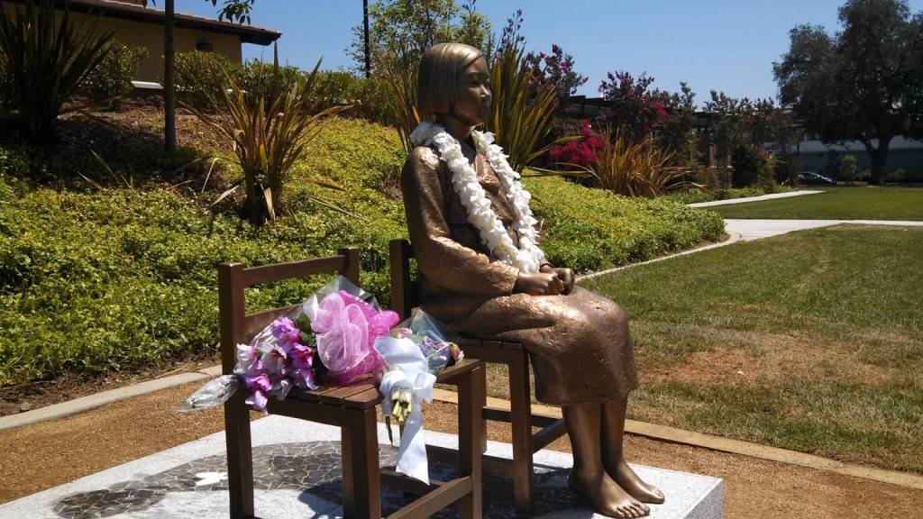 A photo of a memorial statue honouring the thousands of WWII "comfort women" victims who endured sexual slavery at the hands of the Japanese Imperial Army.
