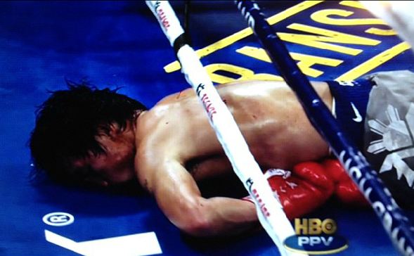 Manny Pacquiao lies on the canvas moments after being knocked out by Juan Manuel Marquez in 2012.