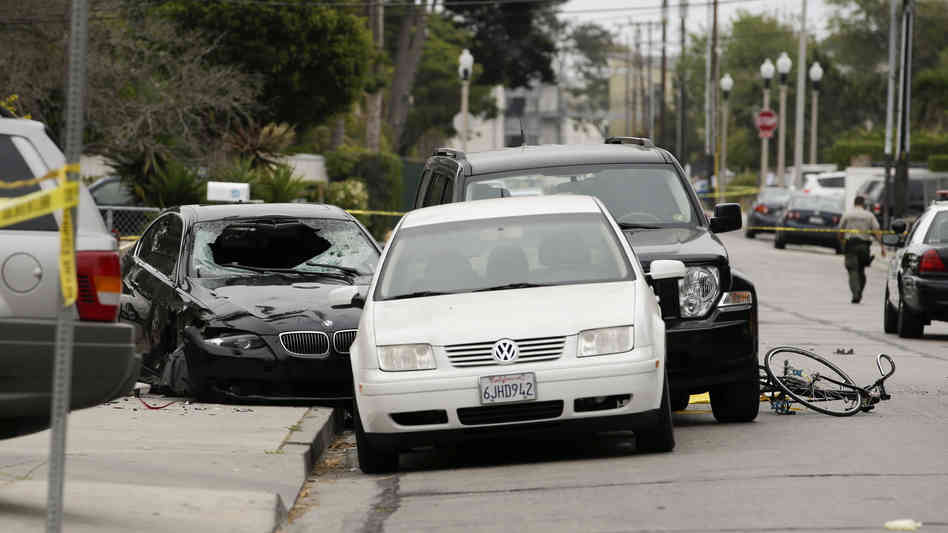 The wreckage of Elliot Rodger's black BMW sedan after his deadly shooting rampage Friday evening. (Photo credit: Jae C. Hong / AP)