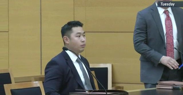 NYPD officer Peter Liang, accused of manslaughter in the killing of Akai Gurley, at the first day of his trial. (Photo credit: Twitter)