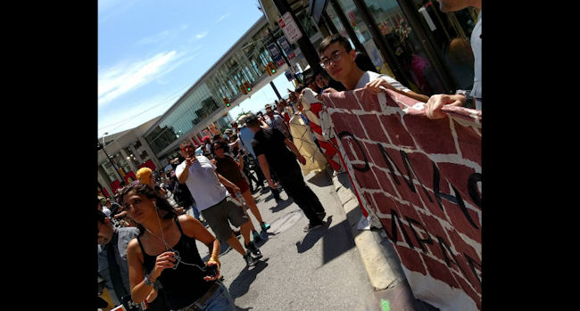 #WallofTrump demonstration organized by the #ItTakesRoots Caravan. (Photo Credit: Timmy Lu / Instagram)