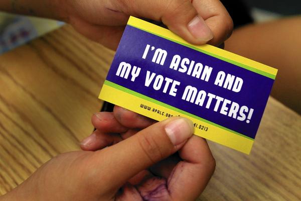 Sticker from the Asian Pacific American Legal Center. (Photo credit: Glenn Koenig, / LA Times)