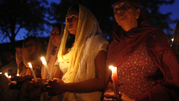 Members of the Wisconsin Sikh community held a candlelit vigil after six Sikhs were brutally murdered at a temple in Oak Creek, Wicsonsin.