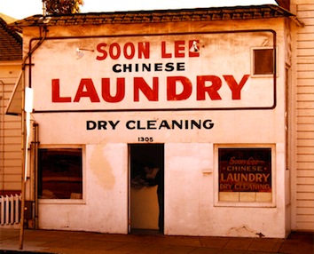 The stereotype of the Chinese laundry comes from historical anti-Chinese exclusion from other forms of work. Chinese laundries became one of the few forms of work open to early Chinese migrants, but also became an indirect way of targeting Chinese residents in California with overtly race-neutral discriminatory laws. 