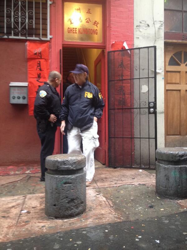 FBI standing outside of the Ghee Kung Tong Stone Temple in San Francisco's Chinatown, home of the Chinese Freemasons. (Photo credit: @sfkale/Twitter)