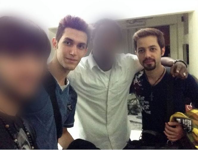 According to a CNN iReporter, missing passengers Pouri Nourmohammadi, 18, and elavar Seyed Mohammad Reza, 29 -- the two passengers flying on forged passports -- took this picture with their roommates in Kuala Lumpur moments before boarding MH370. Photo Credit: CNN/iReport