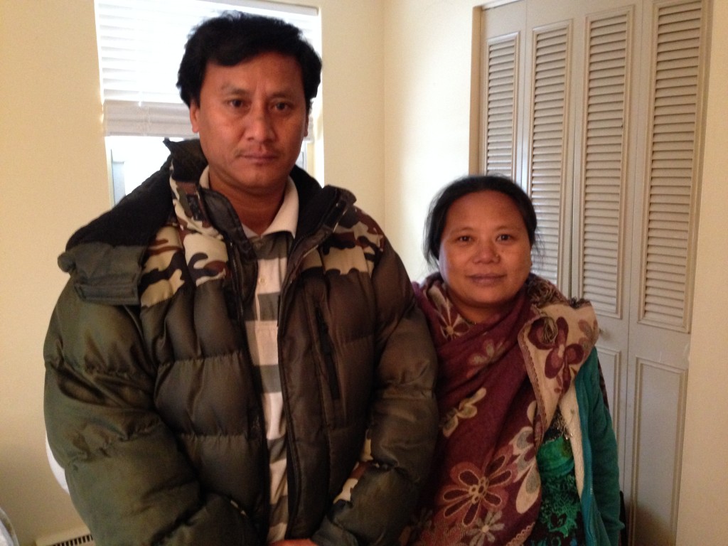 Bhutanese American Tara Gurung and her husband. Tara's father, Ram Gurung, counseled fellow refugees from committing suicide. However, after moving to the United States with his wife and two adult daughters, Ram Gurung committed suicide last year at the age of 73. (Photo credit: Ryan Lessard, NHPR)