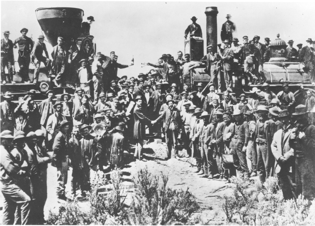 This historic photograph captured the ceremony celebrating the completion of the transcontinental railroad, which united east and west coasts of this country by a land route for the first time; yet, the thousands of Chinese Americans who helped build the railroad were conspicuously absent. Photo credit: Wikipedia