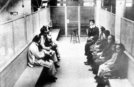 Chinese and Japanese women are detained in immigration barracks in the 1920's. 