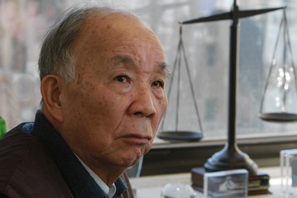 Kang Chung Wong says he has suffered permanent damage following the beating by NYPD officers. (Photo credit: Jesse Ward / NY Daily News)