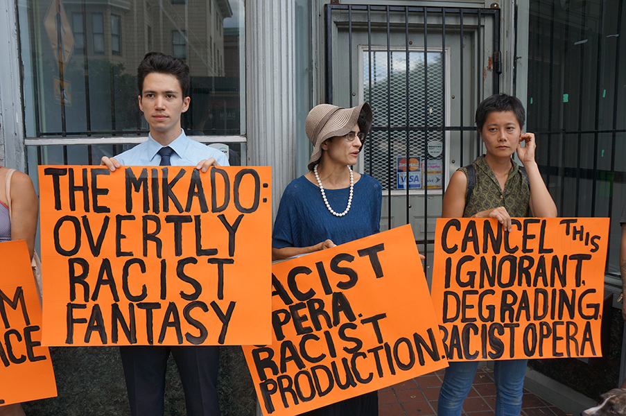 Providence, Rhode Island residents protest Opera Providence's recent yellowface staging of "The Mikado". (Photo credit: James McShane)