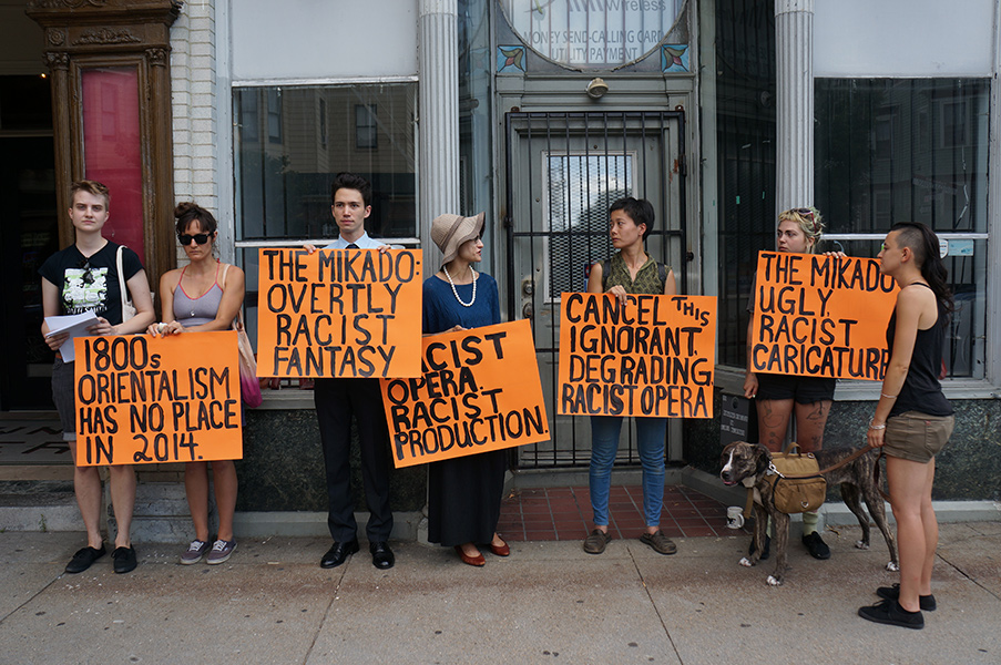 Protesters stage a peaceful protest of "The Mikado" by Opera Providence in Rhode Island. (Photo credit: James Glantz)