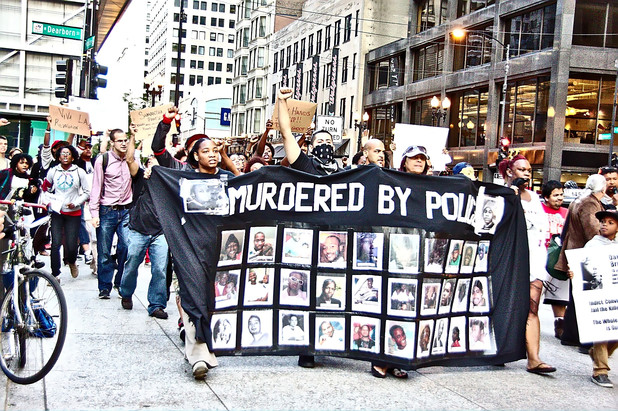 A protest in Chicago against police brutality in the wake of Mike Brown's killing. (Photo credit: Flickr / Mikasi)