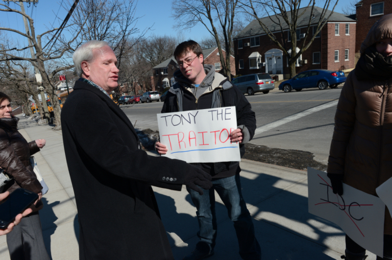 Senator Tony Avella is protested at a campaign event by a small group for his switch to the Independent Democratic Conference (IDC). (Photo credit:  Debbie Egan-Chin / New York Observer)