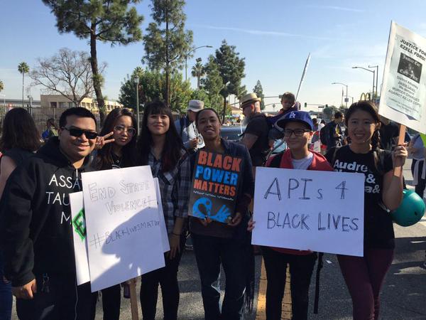 A photo at a #BlackLivesMatter rally tweeted by @aauyeda to #APIs4BlackLives.
