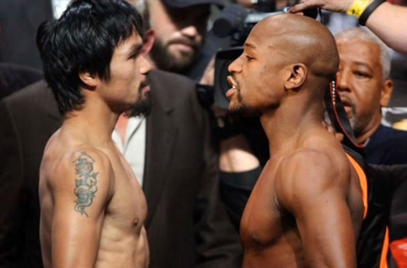Mayweather and Pacquiao stare each other down.