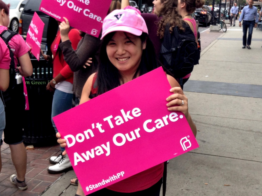 I wore a lot of pink and stood on a street corner and chanted for an hour today. (Photo credit: Jenn / Reappropriate)