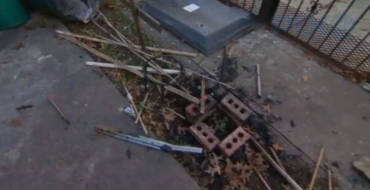Debris from suspected arson attack. (Photo credit: Screen capture from PIX11 news report)