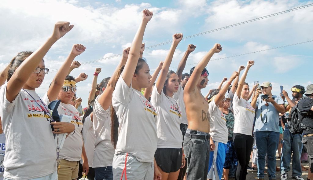 Protesters demonstrate on August 11, 2016 against the start of construction for the Dakota Pipeline Project. (Photo credit: Tom Stromme / Associated Press)