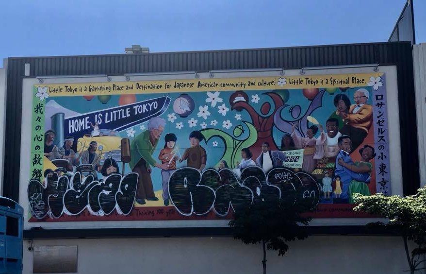 The "Home is Little Tokyo" mural after it was spray-painted by an unknown graffiti artist. (Photo credit: Adina Mori-Holt)