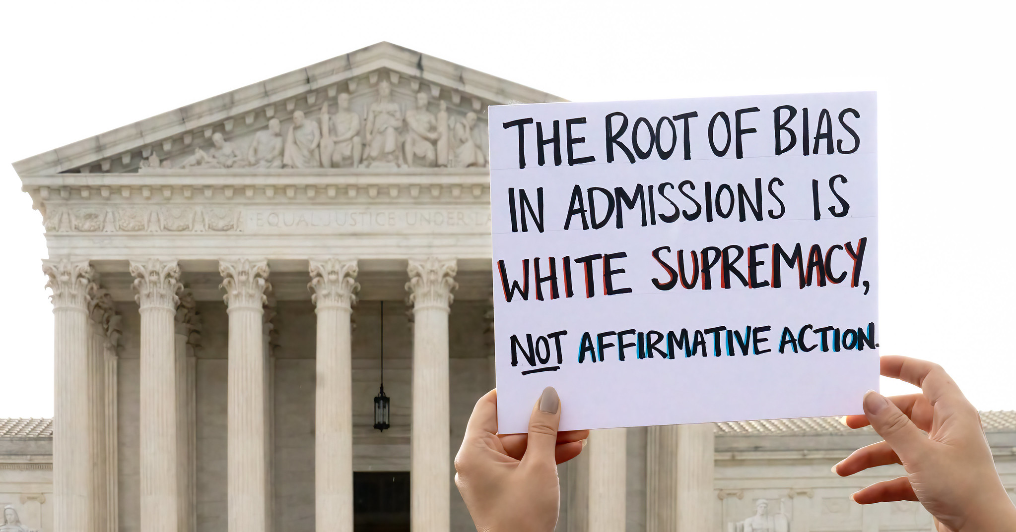 Outside the Supreme Court as affirmative action cases argued inside - Students for Fair Admissions ,Inc. v. President & Fellows of Harvard College, and Students for Fair Admissions, Inc. v. Univeristy of North Carolina (Photo Credit: Flickr / Victoria Pickering)